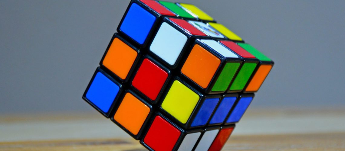 Unsolved rubiks cube leaning